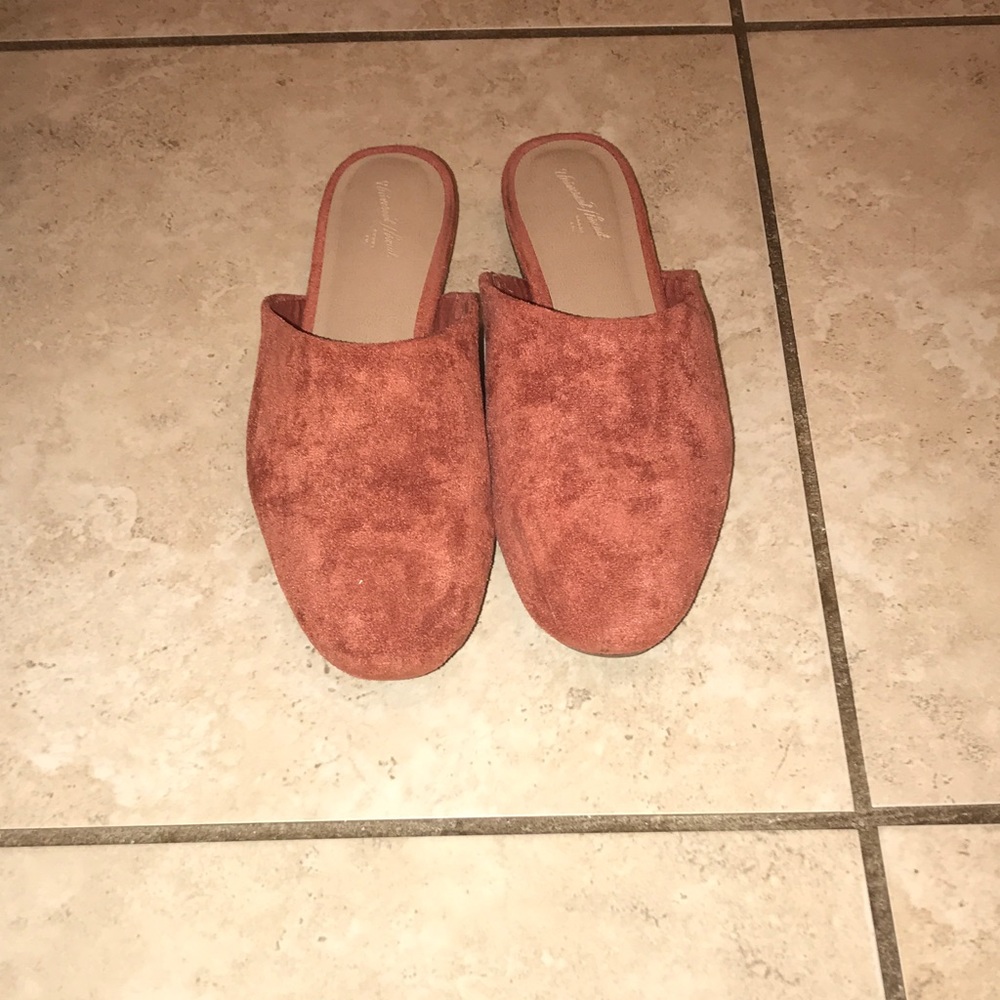 Burnt orange slip on mules